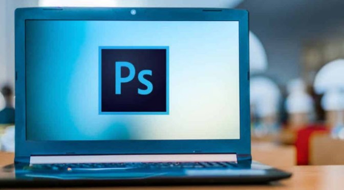 Participants experimenting with advanced editing techniques during an intensive Photoshop workshop.