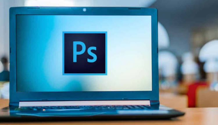 Participants experimenting with advanced editing techniques during an intensive Photoshop workshop.